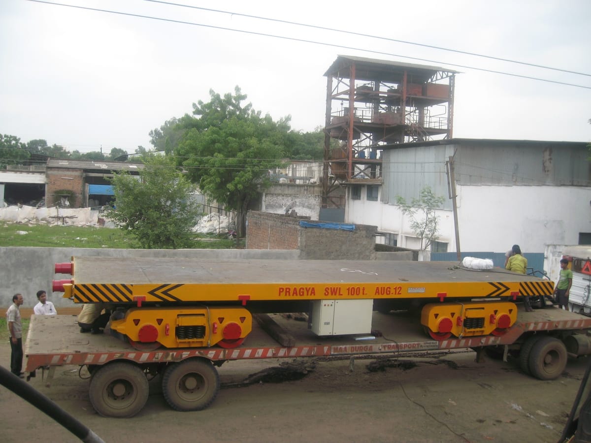 Motorised transfer trolley for steel coil movement β Pragya Precision Equipment