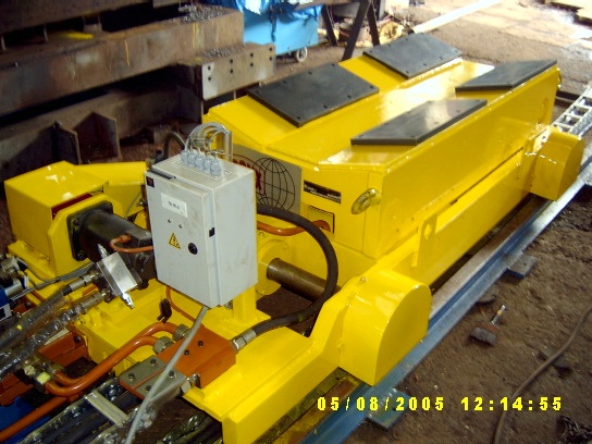 Scissor-type trolley showing the hydraulic scissor lifting mechanism mid-extension
