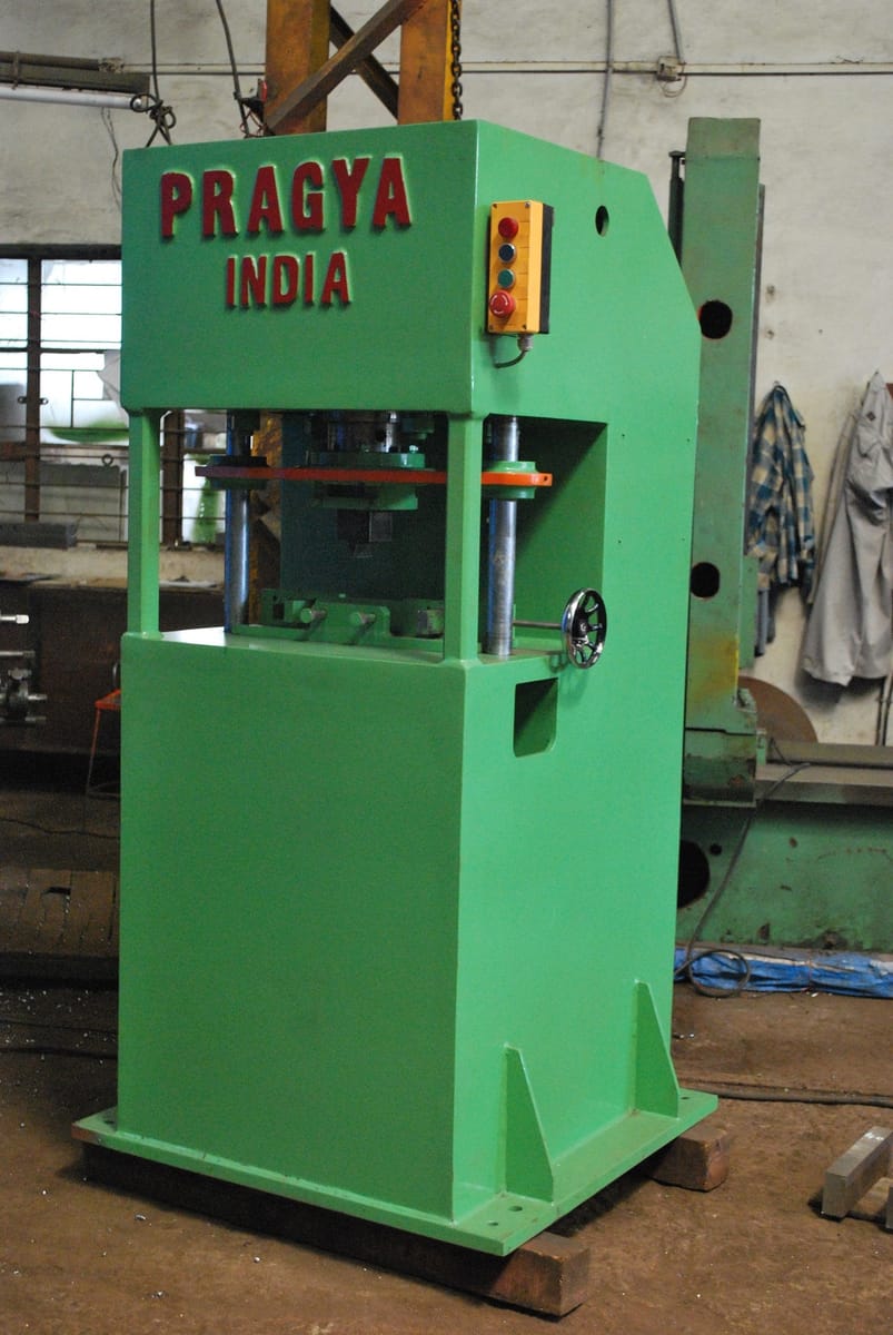 Hydraulic Press in operation performing metal forming